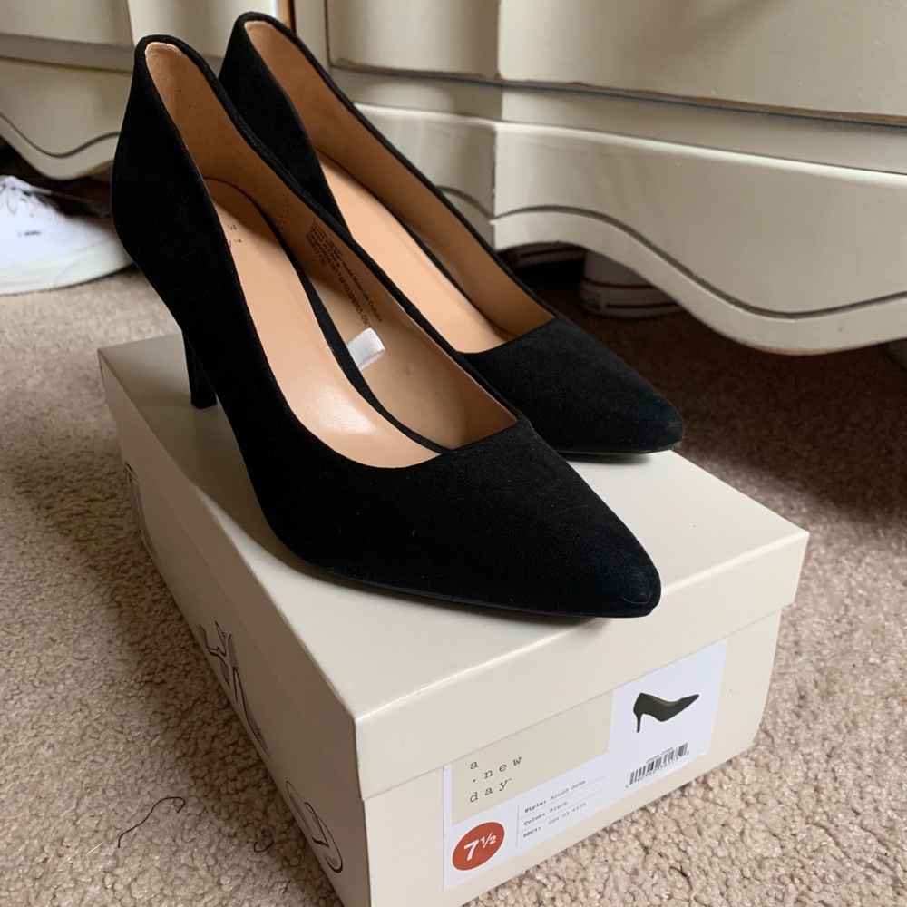 Black pointed dress heals